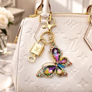 100% Auth Louis Vuitton Lock & Key with unbranded Bagcharm, Keycharm, Keychain